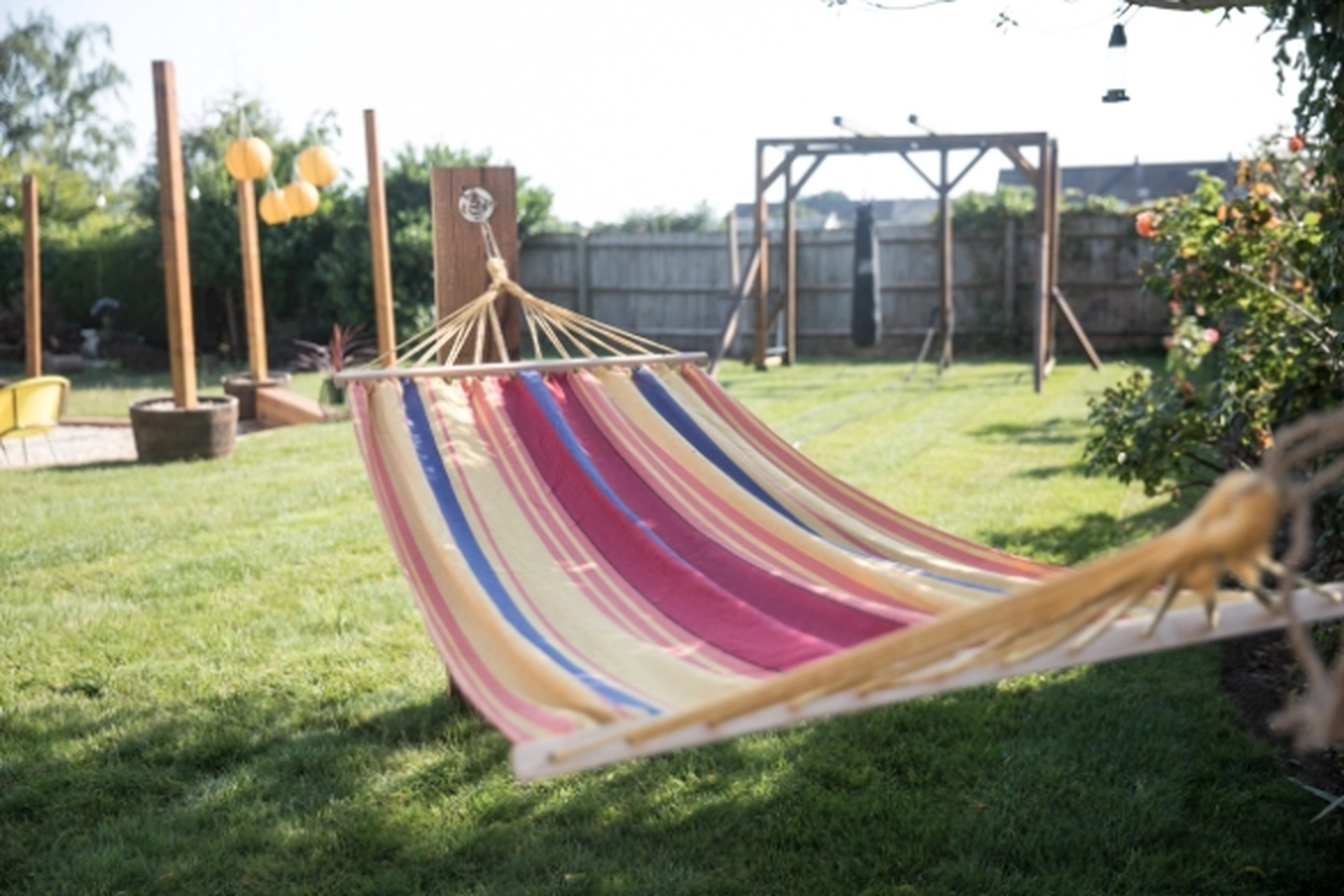 Outdoor garden hammock and wellness space for evening relaxation after working from home
