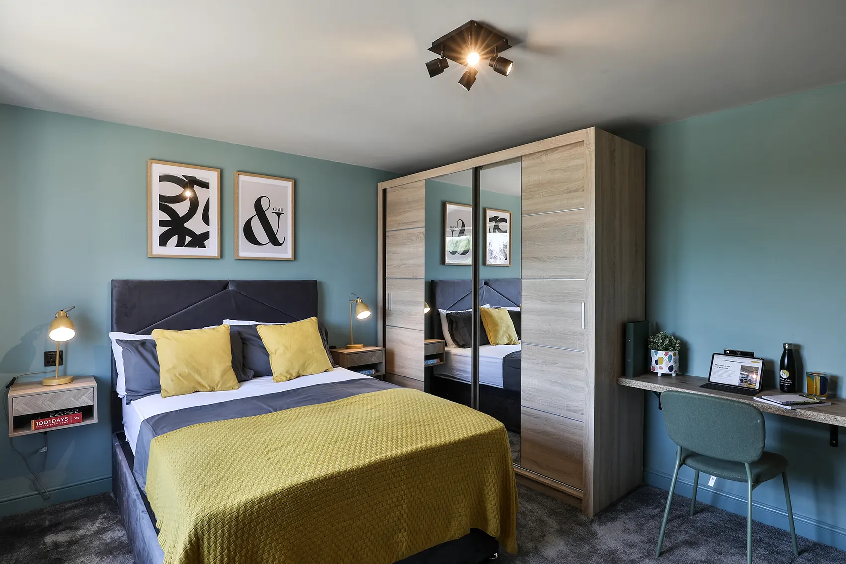 Dedicated workspace desk and task chair in a modern corporate accommodation bedroom