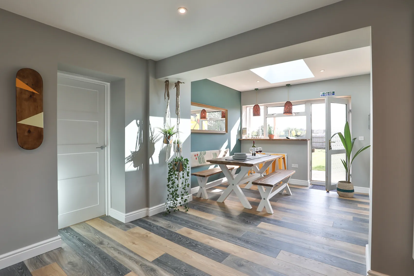 Sunlit dining area with garden access and skylight, reflecting a relaxed, walkable town-centre lifestyle in Bicester