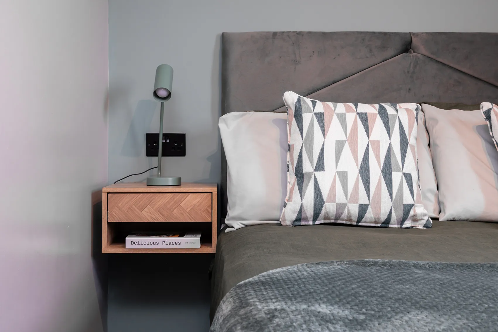 Cozy modern bedroom with bedside lamp and comfortable bed at Wise Court, Bicester, ideal for shift workers